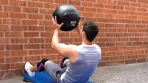 What types of exercises can be performed with slam balls